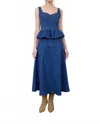 Moon River Savannah Peplum Top In Denim In Blue