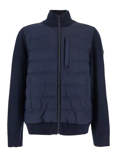 MOOSE KNUCKLES BLUE CARDIGAN WITH KNITTED INSERTS AND LOGO PATCH ON SLEEVE IN WOOL AND TECH FABRIC BLEND MAN