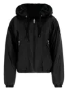 Moose Knuckles Cropped Black Faux Fur Jacket With Plush Hood And Zippered Pockets In Black