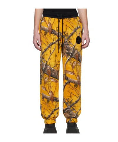 Moose Knuckles Graphic-print Fleece Track Pants In Yellow