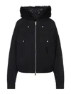 Moose Knuckles Fitted Hooded Jacket With Plush Fur Trim And Metallic Accents In Black