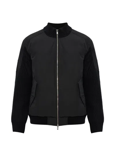 Moose Knuckles Ribbed-knit Panelled Puffer Jacket In Black
