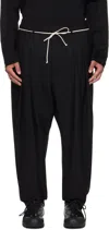 Mordecai Tapered Black Trousers With Pleated Front In Black