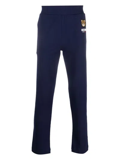 Moschino Leo Teddy-print Track Pants In Blue