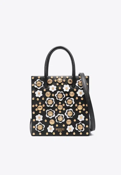 Moschino All-over Floral-appliques Top Handle Bag In Black