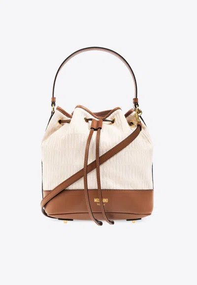 Moschino Monogram-jacquard Bucket Bag In Neutrals