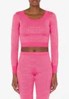 Moschino Cropped Pullover With Allover Logo Pattern In Pink