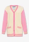 Moschino All-over Logo Wool Cardigan In Multicolor