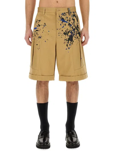 Moschino Bermuda Cargo Shorts With Unique Splatter Print Design In Beige