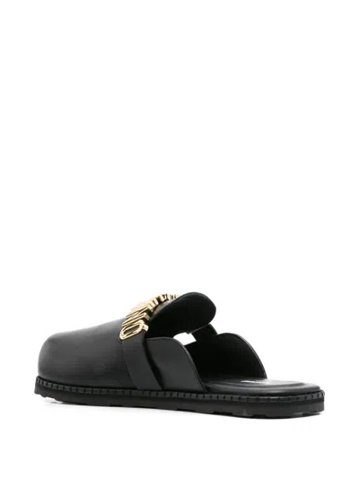 Moschino 'birky' Sabots In Black
