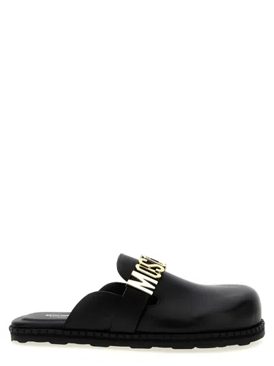 Moschino Round Toe Flat Sole Mules In Black