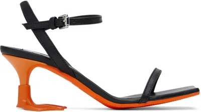 MOSCHINO BLACK DUCK HEELED SANDALS