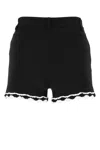 Moschino High-waist Lace-trim Buttoned Shorts In 1555