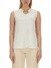 Moschino Blouse With Heart Applique And Subtle Keyhole Detail In White