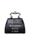 Moschino Handle With Care Bag In Black