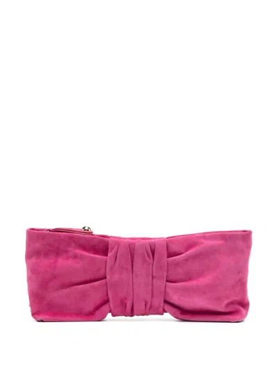 Moschino Bow Clutch Bag In Pink