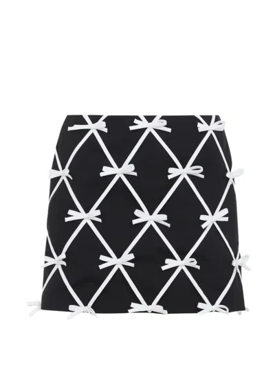 Moschino Bow Mini Skirt Virgin Wool Lattice In Black