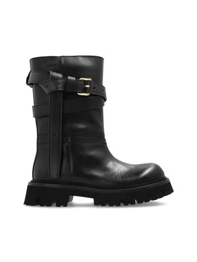 Moschino Buckle-strap Boots In Black