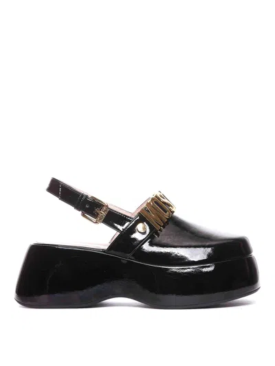 Moschino Maxi Lettering Wedge Mules In Black
