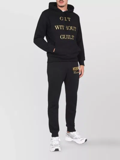 MOSCHINO "CONSCIENCE SANS CULPABILITÉ" SWEATSHIRT