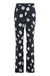 Moschino Floral Pattern Cotton Trousers In Black