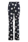 Moschino Floral Pattern Cotton Trousers In Black