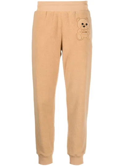 Moschino Couture Beige Teddy-bear Detail Cropped Trousers For Women In Tan
