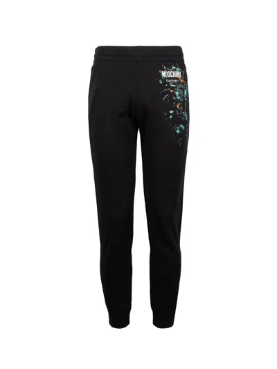 Moschino Couture Black Cotton Track Pants With Logo Print And Paint Splatter Detail For Men