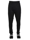 Moschino Jogging Pants With Adjustable Drawstring And Zippered Pockets