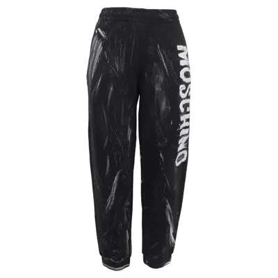 Moschino Couture Logo Paint Accent Jogger Pants In Black Cotton