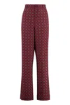 Moschino Couture Printed Silk Pants In Brown