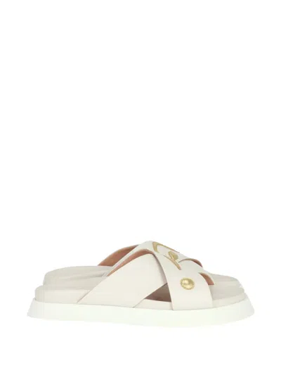 Moschino Cross Strap Logo Sandal In Neutral