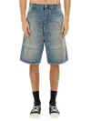 Moschino Distressed Denim Shorts In Denim