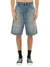 Moschino Distressed Denim Shorts In Blue