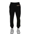 Moschino Multicolor Logo Jogging Pants In Black