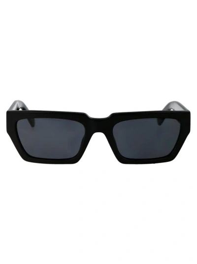 Moschino Eyewear Rectangle Frame Sunglasses In Black