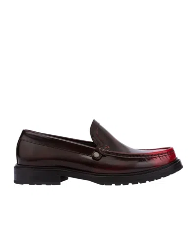 Moschino Faded-effect Leather Loafers In Black