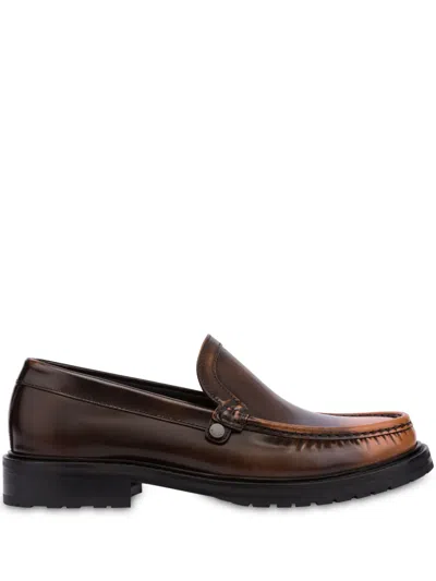 Moschino Faded-effect Leather Loafers In Brown