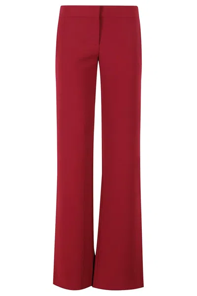 MOSCHINO FLARED STRETCH PANTS WITH MEDIUM WAIST
