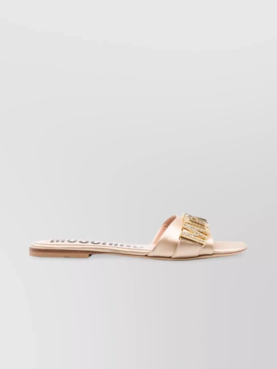Moschino Flat Sole Open Toe Sandals With Metallic Crystal Embellishments In Cream