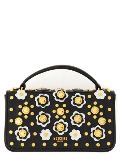 Moschino Floral Stud Embellished Logo Plaque Shoulder Bag In Black Multi