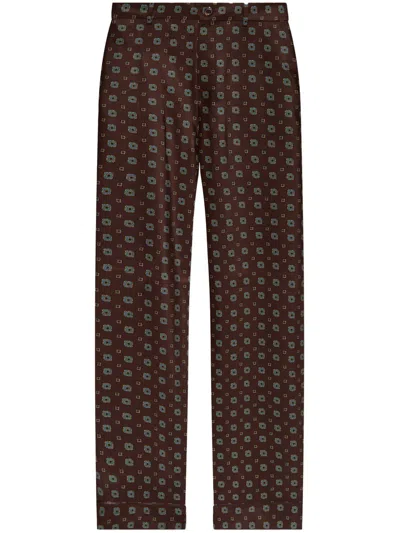 Moschino Geometric-print Trousers In Brown