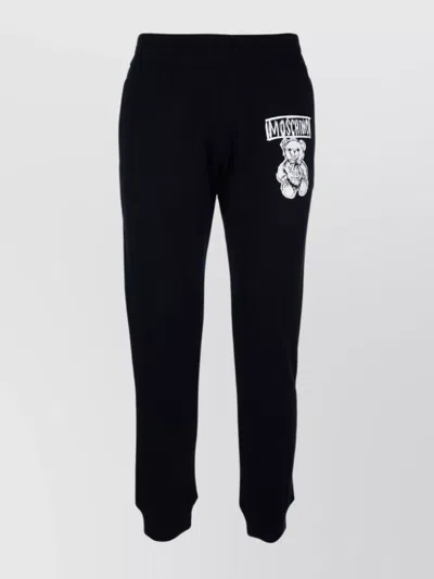 MOSCHINO GRAPHIC PRINT RIBBED CUFFS TROUSERS