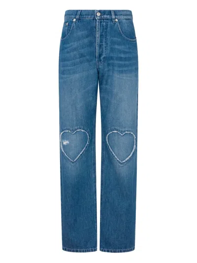 Moschino Straight-leg Denim Trousers With Frayed Heart Patches In Blue