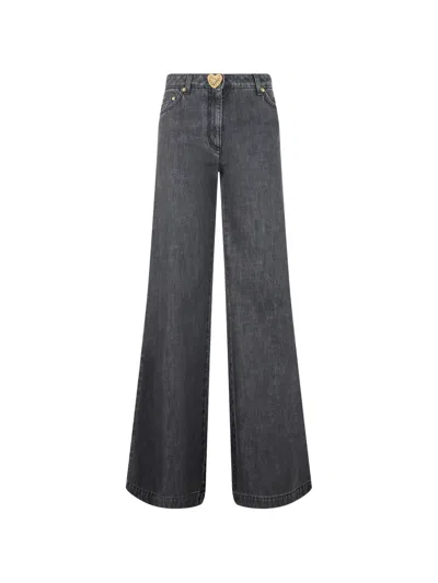 Moschino Heart-button Wide-leg Jeans In Gray