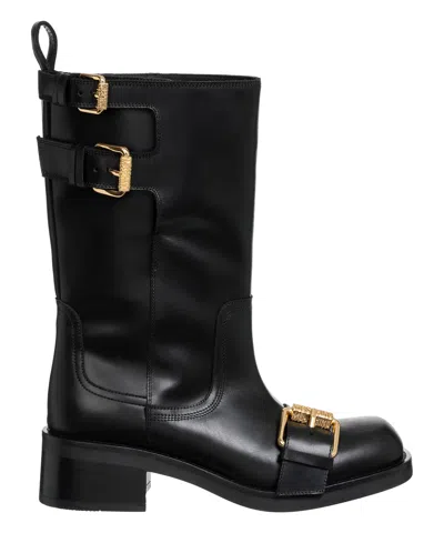 Moschino Heeled Boots In Black