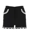 Moschino High-waist Lace-trim Buttoned Shorts In Black