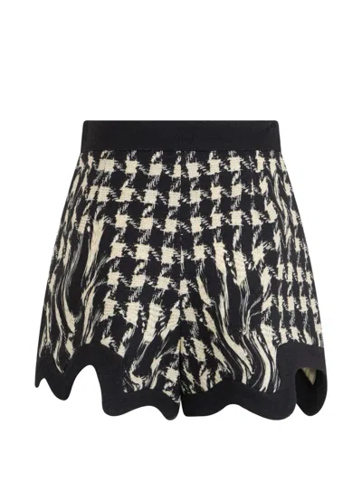 Moschino Houndstooth-pattern Wavy-hem Shorts In Brown
