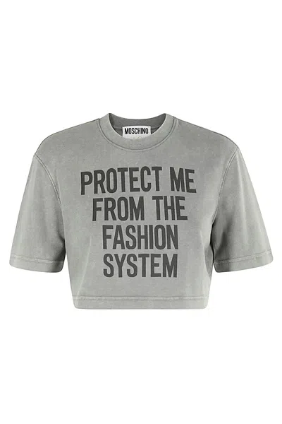 Moschino Slogan Printed Crewneck Cropped T-shirt In Neutral