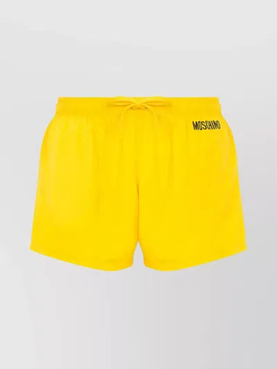 Moschino Knee-length Swim Shorts Graphic Print In Yellow